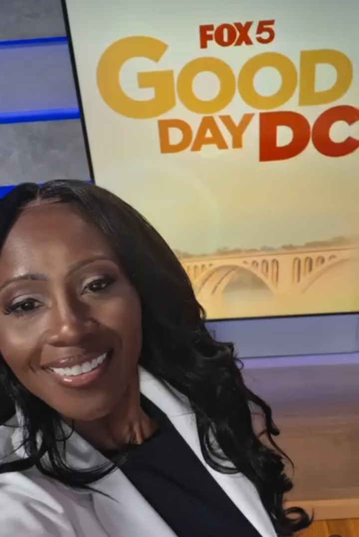 Ayi smiling on the Fox 5 Good Day DC set